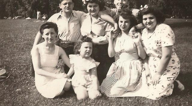 L to R: Sylvia Kershenbaum Baellow w Harla Lee Baellow Loving, (kneeling in back, starting at left), Robert Ribakoff, Goldie Ribakoff Gurvitz, unidentified, (kneeling on ground) Fannie Baellow Stolov and Helen Ribakoff Kujavski