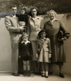 Tudor Misha Bogart holding Mark Hanks.  Below him is my brother Tudor Robin.  My mother Luisa Evelyn (Guida) Bogart.  JoKaren, Sophie Bogart pre 1953. See notes.