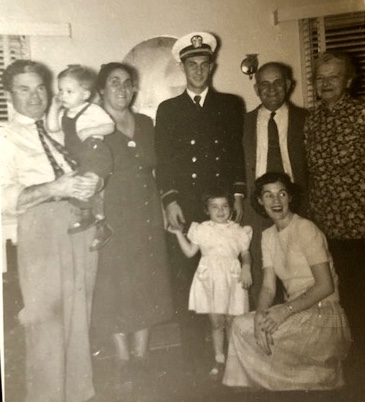 Nick Guida holding Tudor Robin, Nora Guida, Tudor Misha (in the uniform), Jokaren (standing in front of him), Luisa (kneeling), Misha Bogart and Sophie Bogart. 1950. See notes.