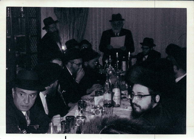 Isaac Frieder standing top left.  Moishe Sanel bottom right, Feter Isaac Klein speaking at an engagment party