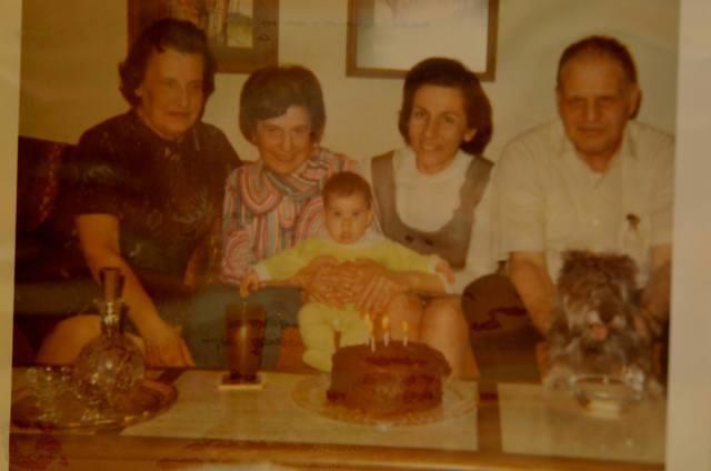 Thelma and Ted Clutz holding Greg Clootz