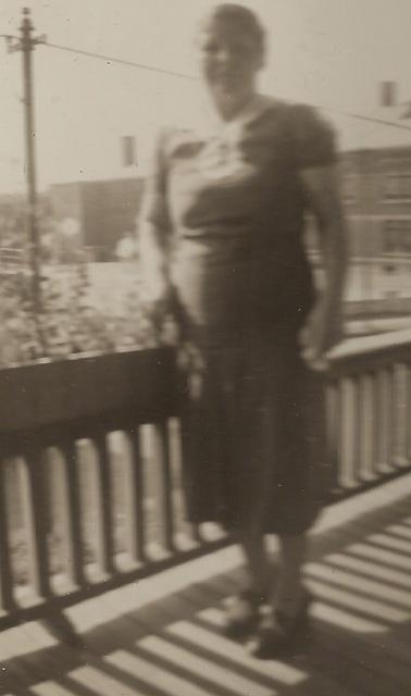 Ella Bogart by the balcony that "my brothers threatened to throw me off" -Edith