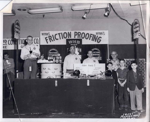 L to R:  Irving Brown, Clarence Craig, Louis Cohn, Joseph Bernstein, w Les Cohn, Clarence Craig's son, and Harvey Jacobson at Wynn Oil Trade Show.  See notes.