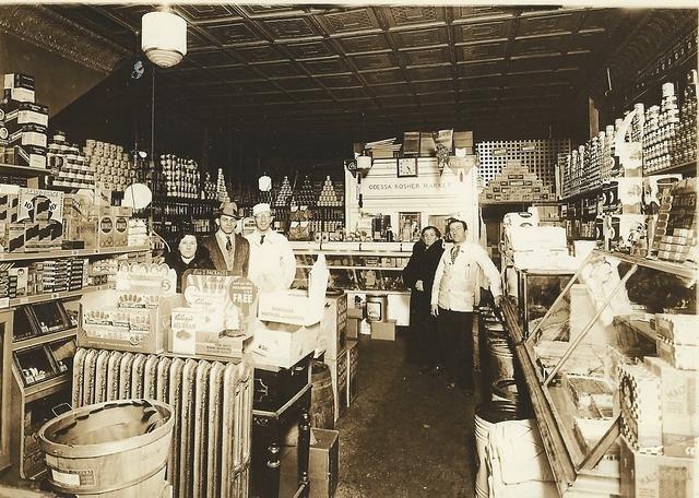 Louis Cohn (delivery boy) with Abe Baellow (butcher) at the Odessa Meat Market, Nov 15, 1936 (front) Louis Cohn, Odessa Meat Market