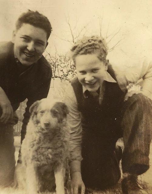 Unknown and Melvin Cohn, dog