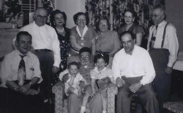 L to R: Ben Schulman, Pete, unknown,  Clara Schulman Dubin, Chike, Mildred, Abe.  On Michel Schulman's lap is Joel and Sherry Levine, Arnold Levine.  See notes. 1954