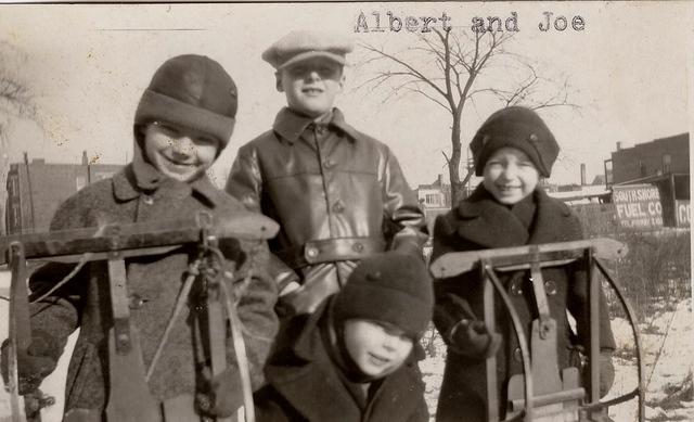 Albert and Joe in the black coats and hats.  See notes.