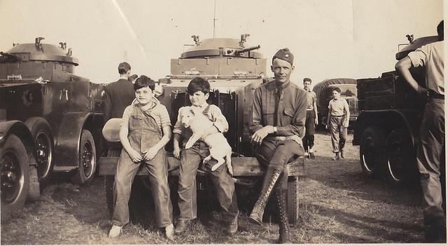 Robert and Abe Ribakoff next to a tank