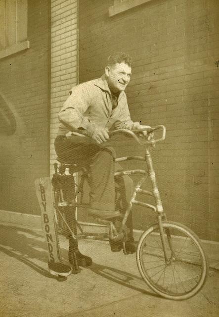 Charlie Steinlauf walking "Victory Bike" Bicycle, 1942