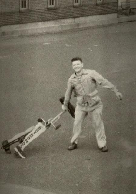 Charlie Steinlauf walking "Victory Bike" Bicycle, 1942