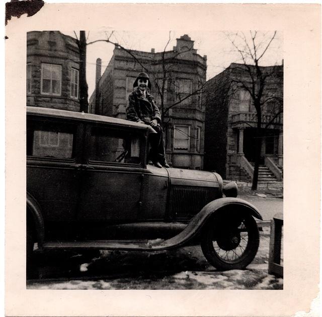 Elli Schuman on Morton Schuman's car, 1939 West Side Chicago