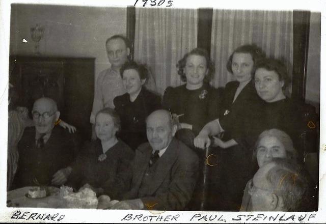 1930's.  Seated L to R: Bernard Steinlauf, Gisella Rosenthal Steinlauf, Paul Steinlauf.  Rest unknown.