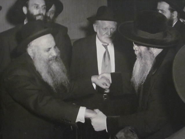 Shloima Weiss dancing w Matesdorfer Rav, Mr. Kramer in the center (?)