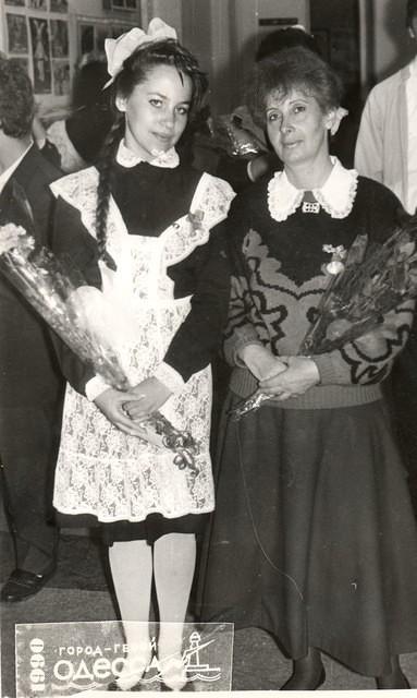 Laura Komar Breitberg with a student