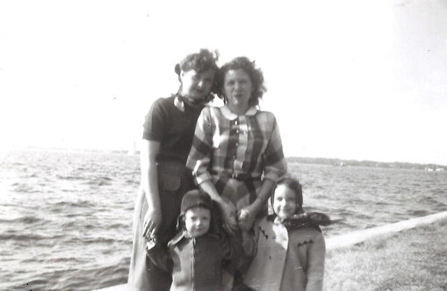 Fannie Cohn Cohen holding hands of her children Marvin and Libby Cohen Needle with Bertie Cohen Levin