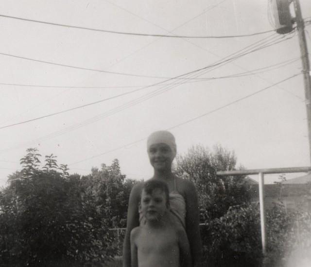 Harvey and Libby Cohen Needle. Backyard of house on Booth in Prairie Village, Ks