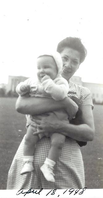 Esther Baellow Wolfson holding Les Cohn, April 18, 1948