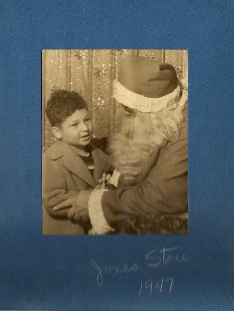 Larry Clootz with Santa Claus at the Jones store, 1947