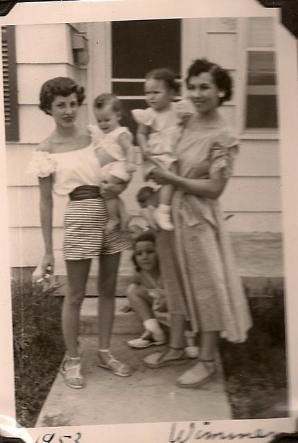 1953 - Charlene Hecht holding Sandy with Thelma Hecht Clutz holding Linda Clutz Cohn, Marcia Clutz Troppsitting