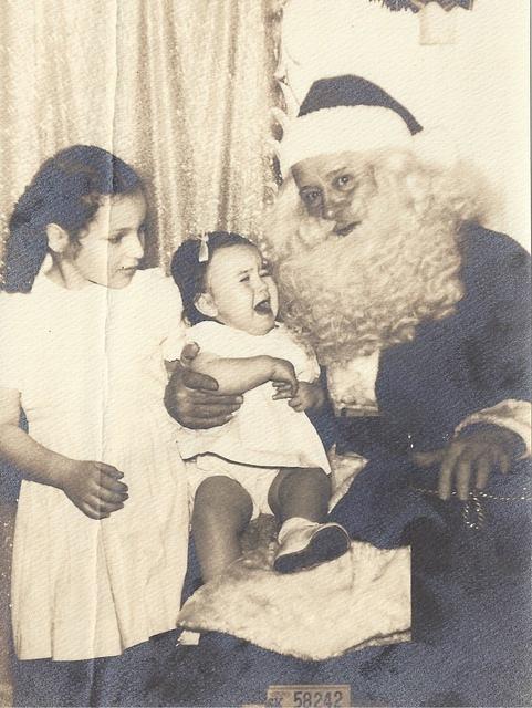 Marcia Clutz Tropp and Linda Clutz Cohn w Santa Claus, 1952