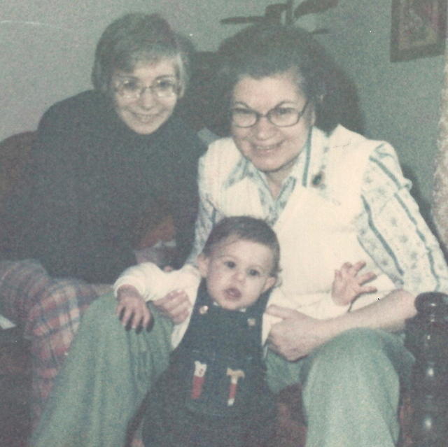 Linda and Eva Cohn Tulchinsky holding Adam