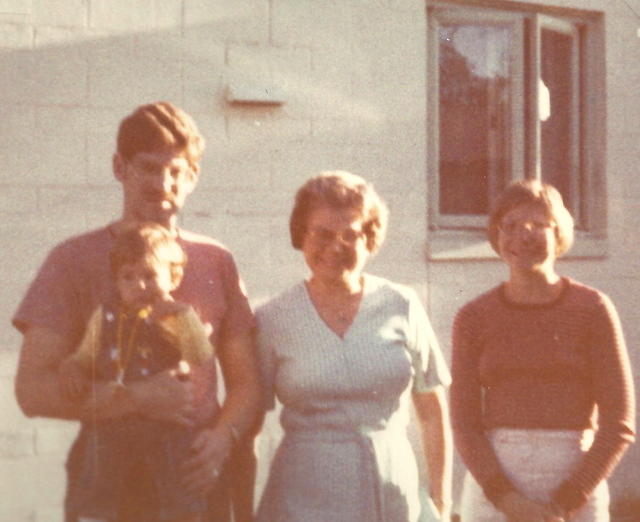 Herb Siegel holding Adam, Eva Cohn Tulchinsky, Linda Tulchinsky Siegel