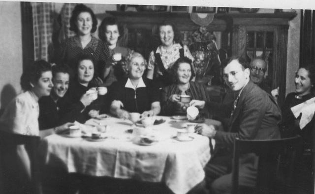 3rd from left is Sarah Steinlauf Schuman, Julias Zaitz, and Berl Bernard Steinlauf peeking behind him.