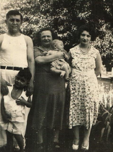 Morris (with Leon in front of him), Bala Komar Baellow (holding baby Norman), and Esther Baellow Levinson