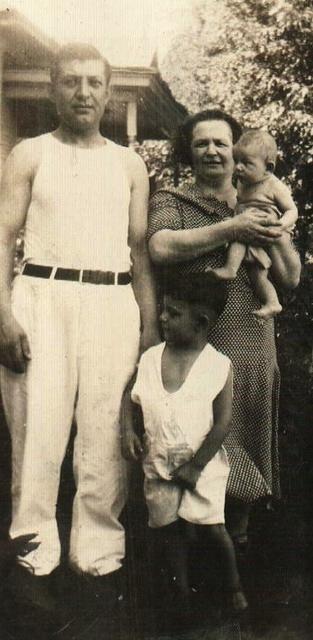 Morris and Bala holding Norman with Leon Baellow