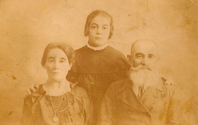 Clara Schulman Dubin w her parents Brana & Yaakov Michel (front)