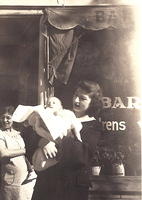 Esther Levinson w son Larry and Esther Portnoy (in the back on the left)