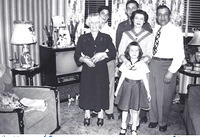 Bala Komar Baellow, Esther Baellow Levinson, Rita Levinson Golding, Morris Baellow.   Back row: Larry Levinson and Norman Baellow who’s on leave.  At Esther and Max Levinson’s house, 1953.