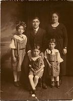 Sarah Baellow Dubin, Morris, Bala Komar Baellow, Milton, and Esther Baellow Levinson about 1920 (front)