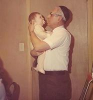 Pesach Seder 1973, Sol Stolov holding Randy Hariton