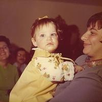 Pesach Seder 1973, Beth Stolov Bayzman holding Tammy Sukiennik