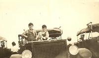 Robert and Abe Ribakoff next to a tank