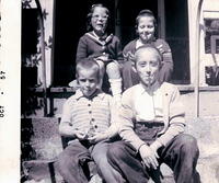 Chanie Farber, Moishey Farber, Seated Front: Heshy Farber, Cousin (Chavush Newmans brother) - October 1957