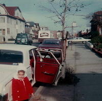 Feigy Breier next to the family car that didn't have air conditioning