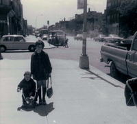 Feigy Breier w Chaim Breier on the tricycle