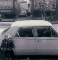 Shiya Breier ? in front of Breier white family car