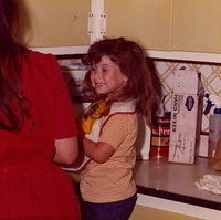 Amy Cohn Jacobson making Larry Clutz' Birthday Cake