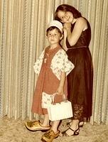 Purim.  Todd and Amy Cohn wearing wooden clogs from the Pelofsky's when they visited Holland.