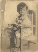 Unknown girl in high chair from Plocki Plotsky family (front)