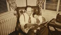 Abe Levine reading to Donna Levine