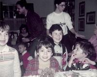 1986 Chanukah - Pam Tropp, Linda Clutz Cohn (background), Hal Magariel, (Front center) David Magariel, Todd Cohn, (Back) Greg Clootz, (front right) Mindy Tropp