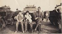 Robert and Abe Ribakoff next to a tank