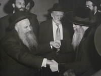 Shloima Weiss dancing w Matesdorfer Rav, Mr. Kramer in the center (?)