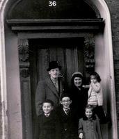 Joe Weiss, Rochel Ganz Bleier holding Naftali, front: Yudel, Shia, Esther Bleier. 1960