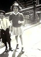 Joe Weiss and Rivka Edith Weiss "In Knickers on Penn Street".  Brooklyn, NY.  1945.