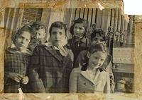 Joe Weiss and Rivka Edith Weiss (in the back) and Flo Weiss Rossof (front right) with friends in Williamsburg, NY. 1945.